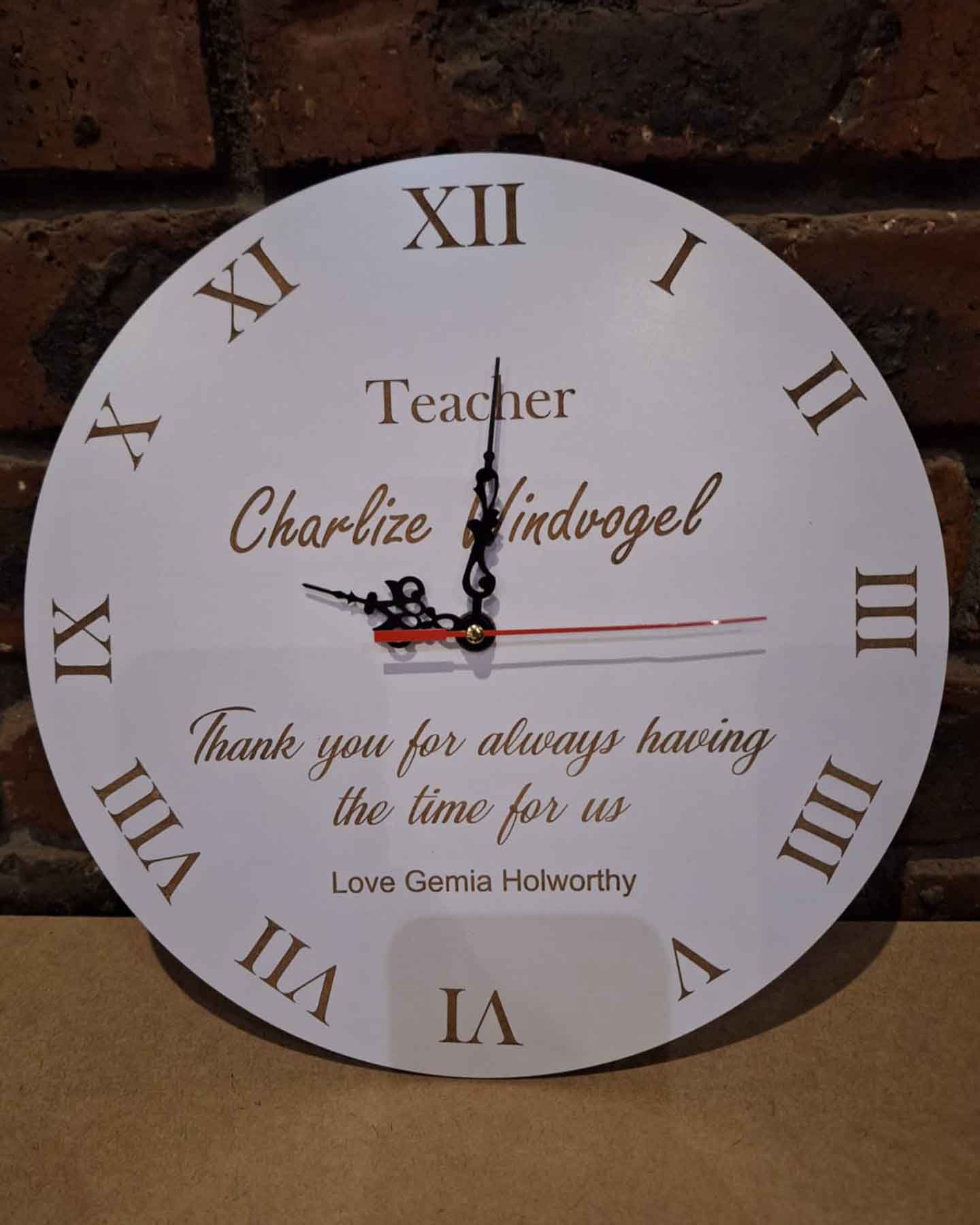 Personalized wall clocks with custom designs and engravings